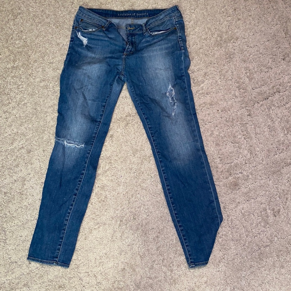 Woman’s Articles of Society size 31 jeans.